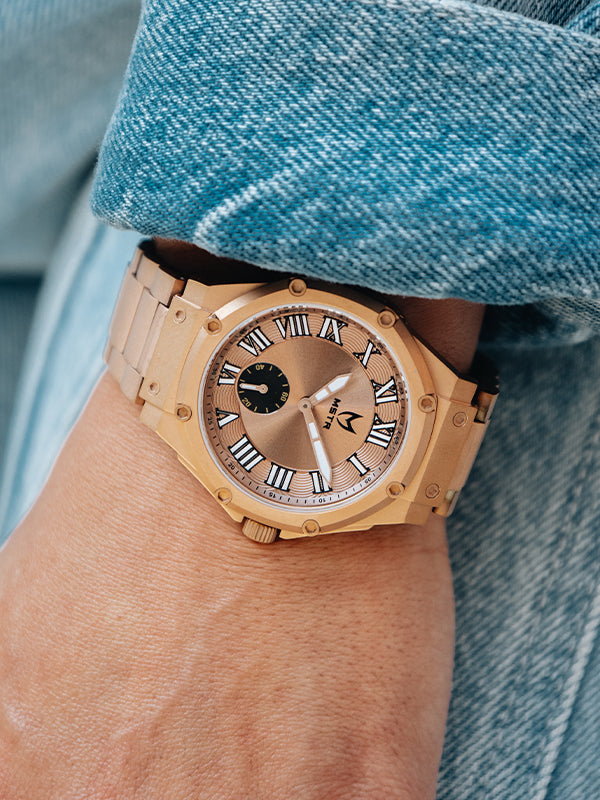 MSTR Ambassador Ultra Slim AU140SS rose gold watch on models wrist