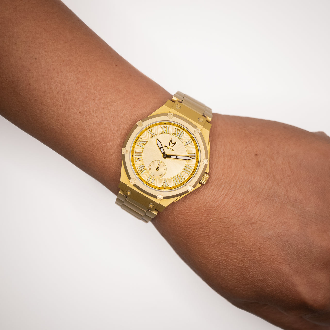 MSTR Ambassador Ultra Slim AU141MV2 gold watch on models wrist