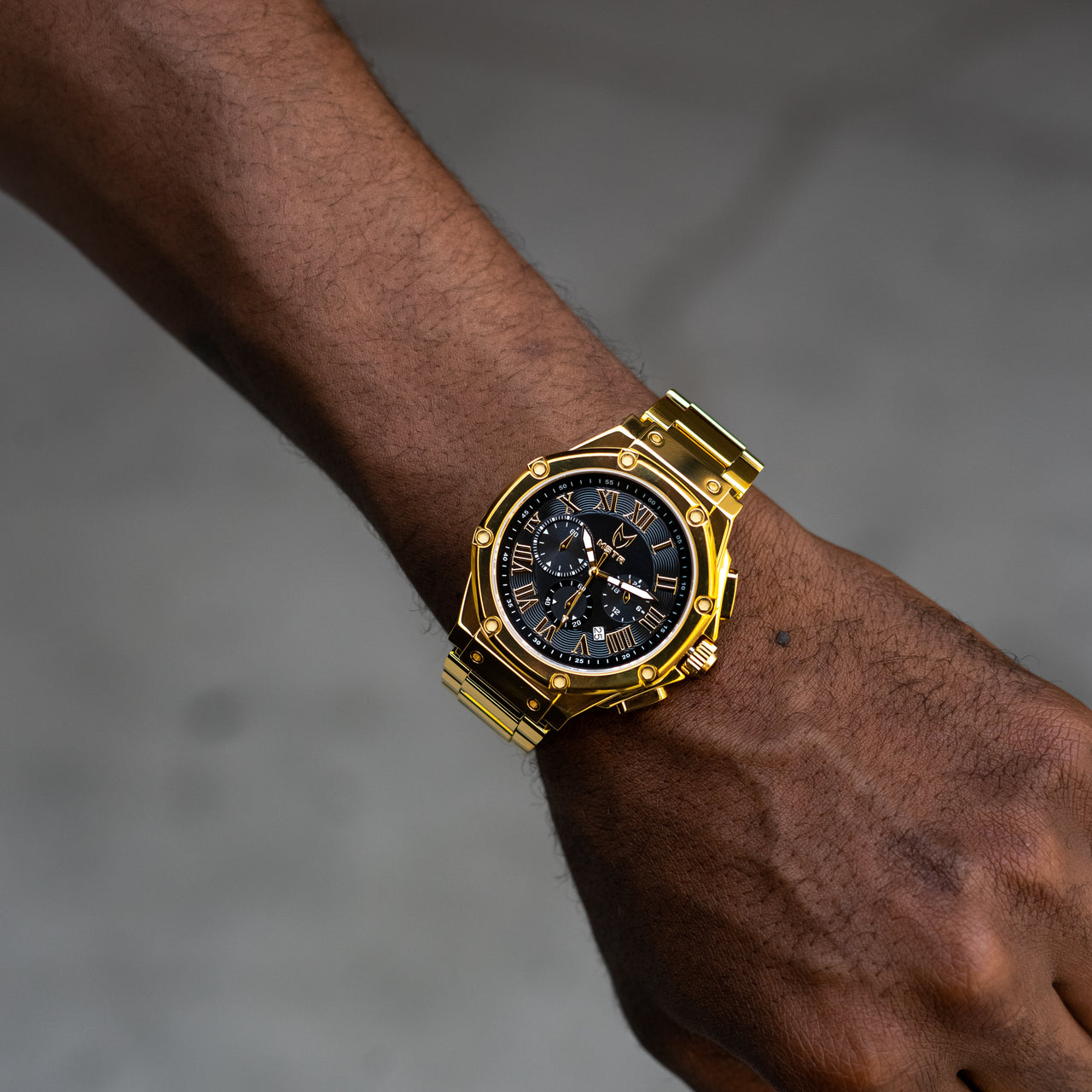 MSTR Ambassador 1001SS gold watch on models wrist