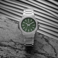 Thumbnail for silver watch with green dial