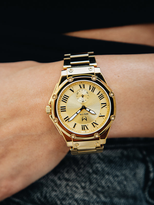 MSTR Ambassador Ultra Slim AU134SS 18k gold watch on models wrist
